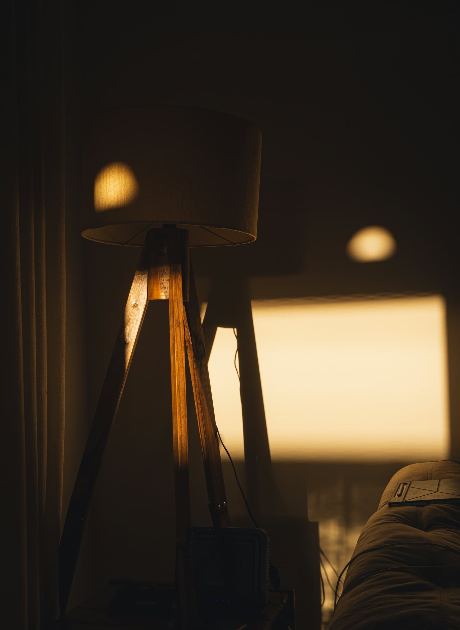 A lamp-lit living room on a winter evening